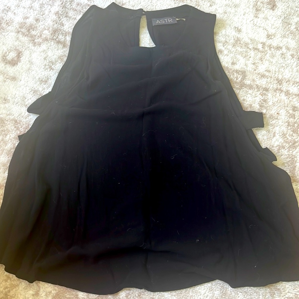 Black tank top with cut open sides